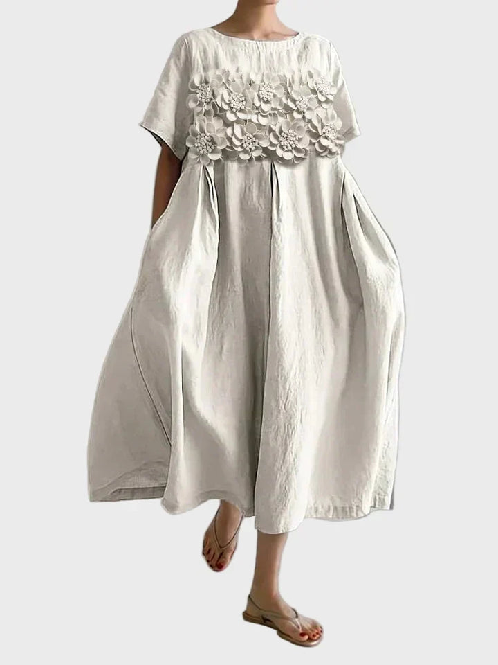 Vestido de lino beige con volantes