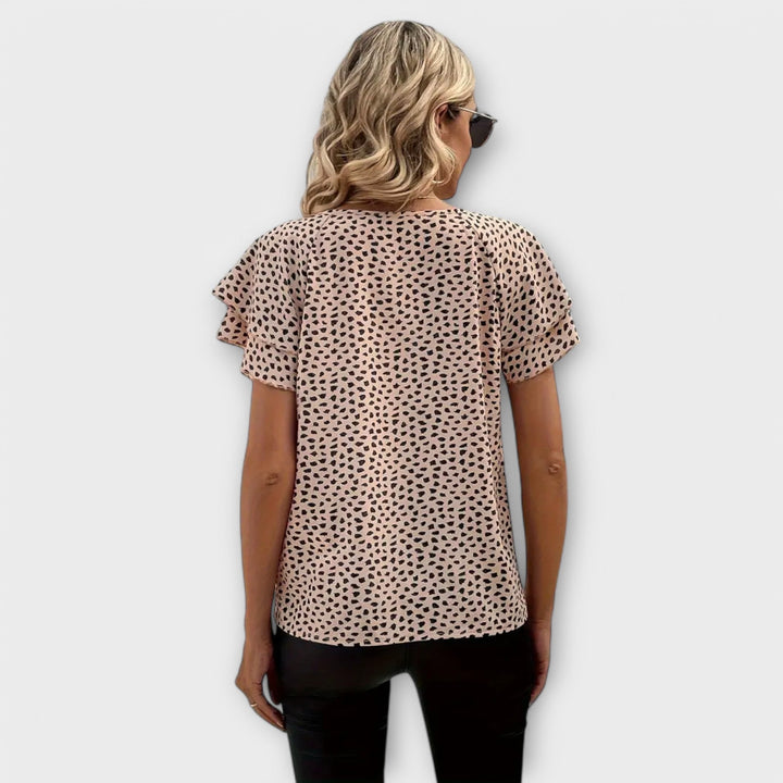 Emily - Blusa beige con estampado animal