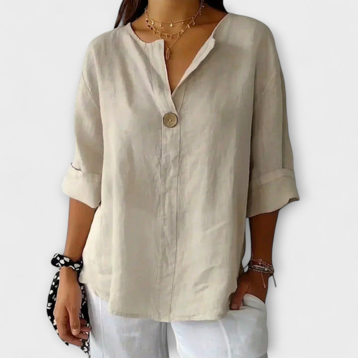 Nicole - Blusa elegante beige con escote en V