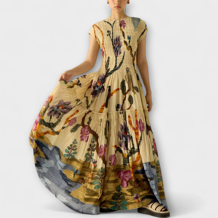 Amanda - Vestido maxi plisado amarillo con estampado