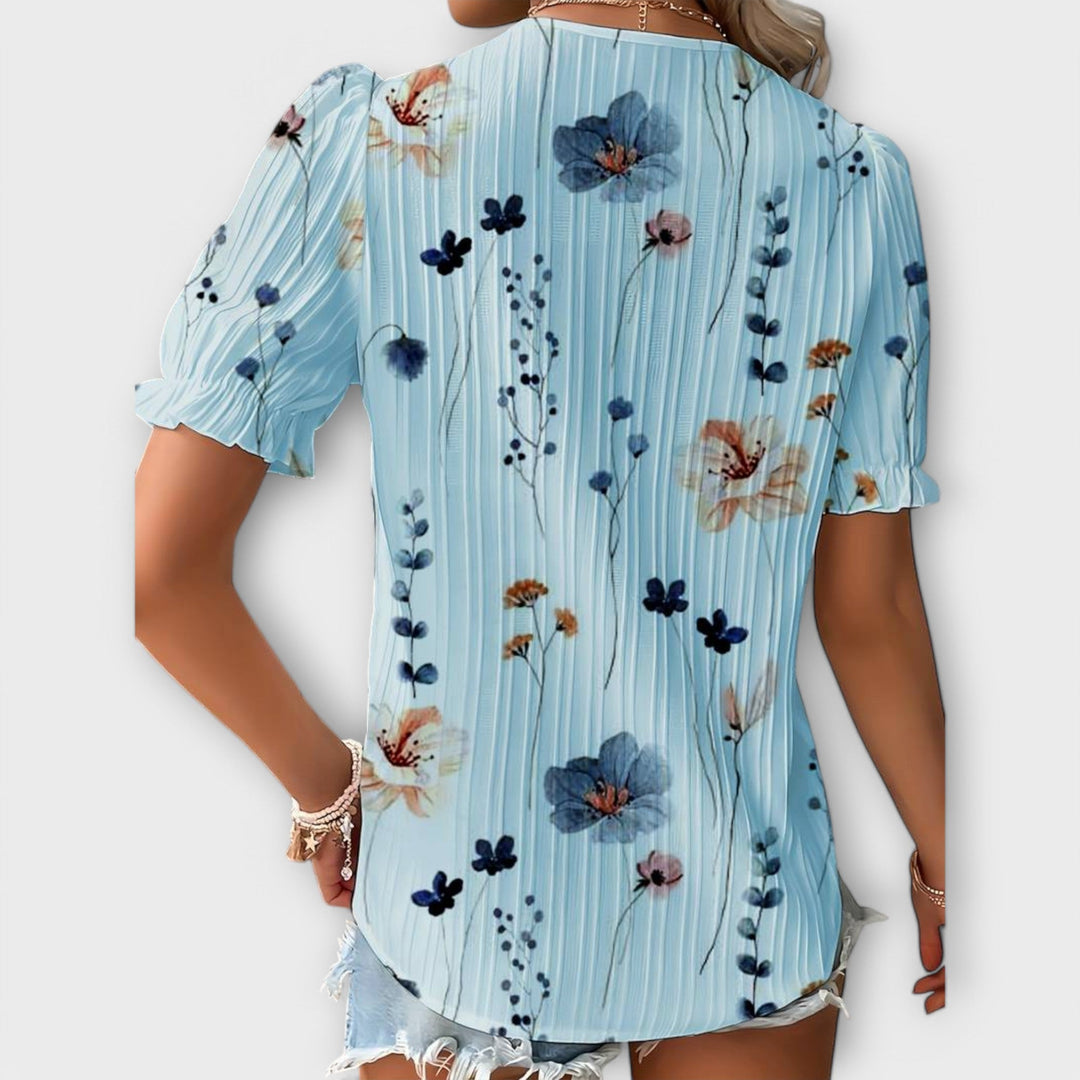 Emily - Blusa rosa con estampado floral y encaje