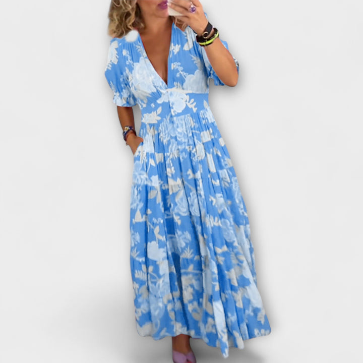 Catrisa - Vestido maxi rojo con estampado de flores y escote en V