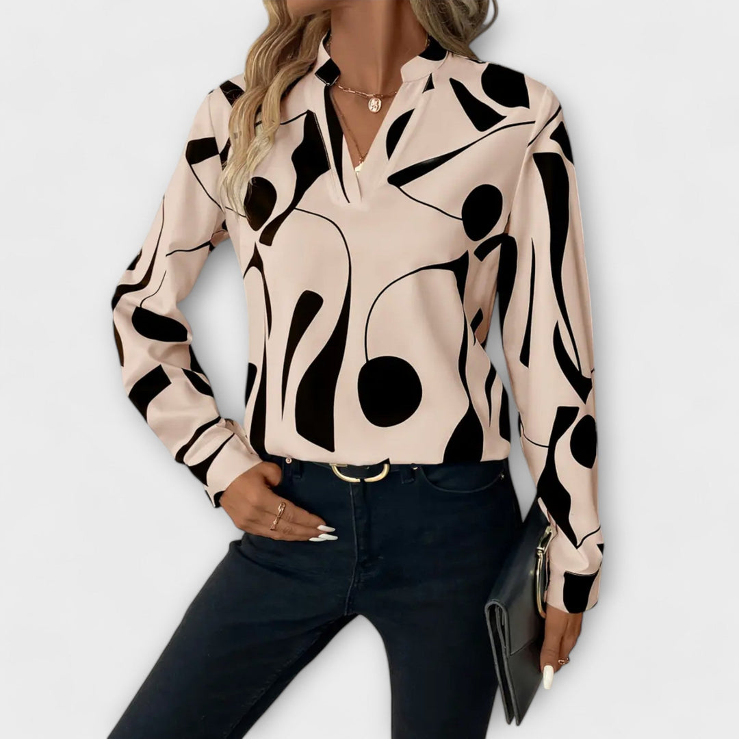 Edith - Blusa blanca y negra con diseño gráfico