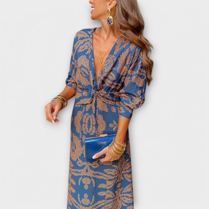 Oriana - Vestido azul con estampado dorado