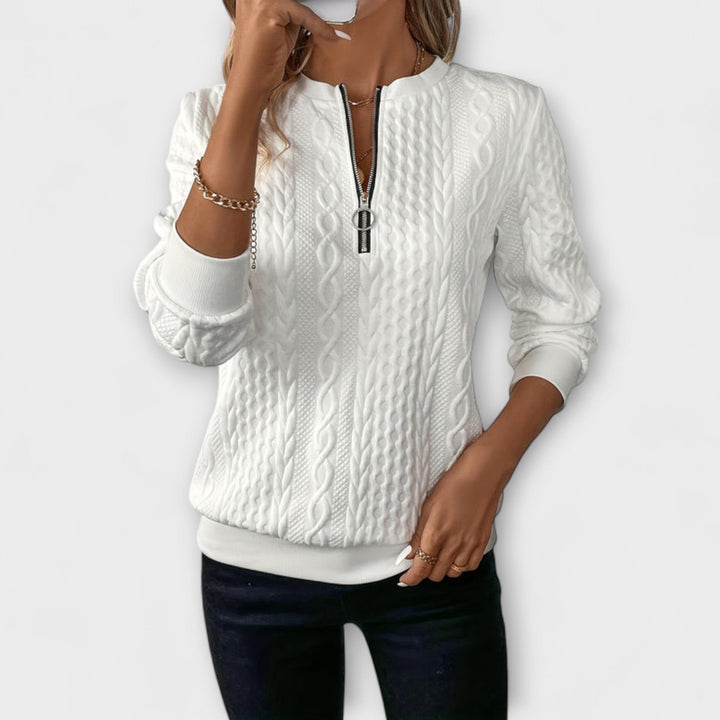 Joy - Jersey elegante de punto con patrón de trenzas