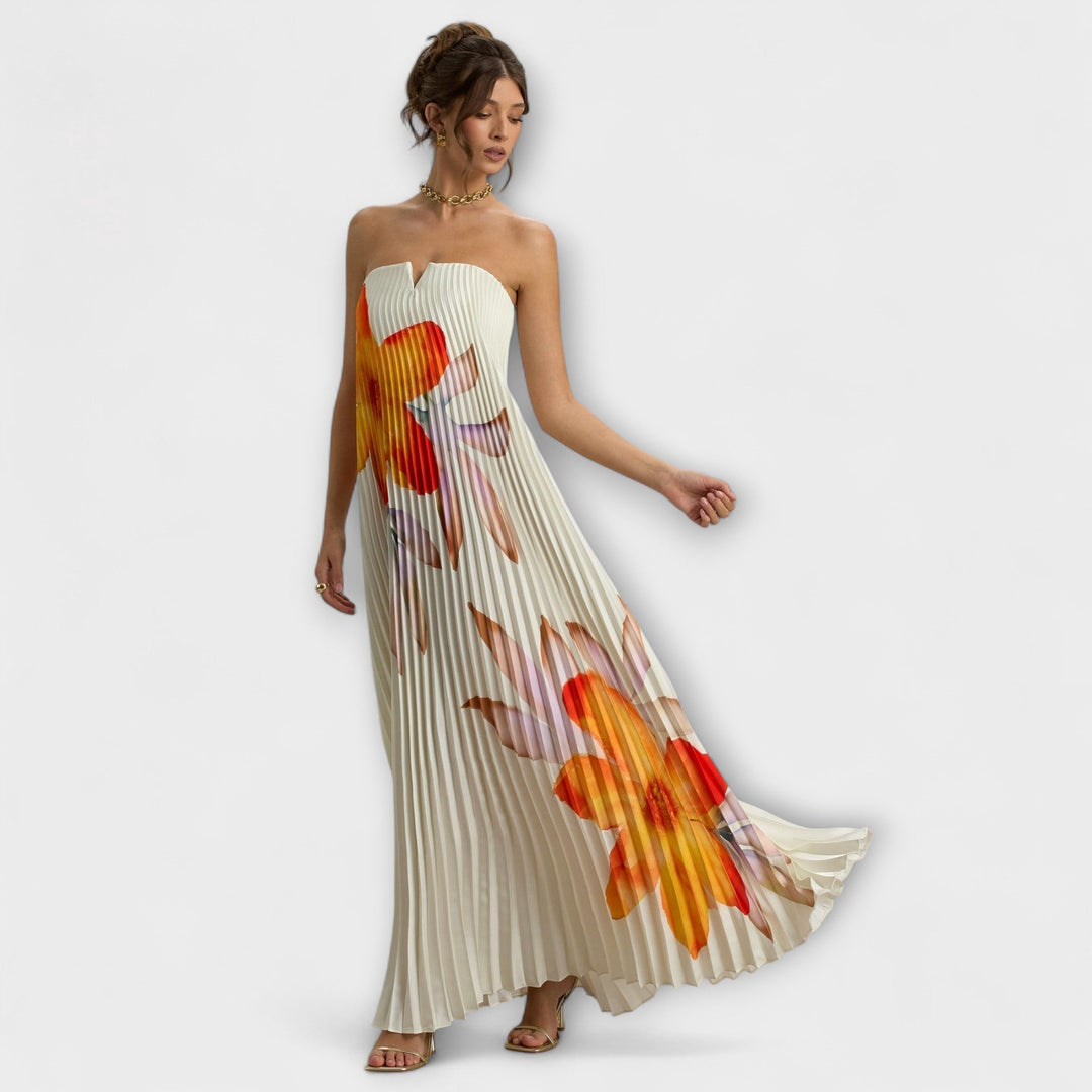 Michelle - Vestido maxilargo color crema con estampado de flores naranjas