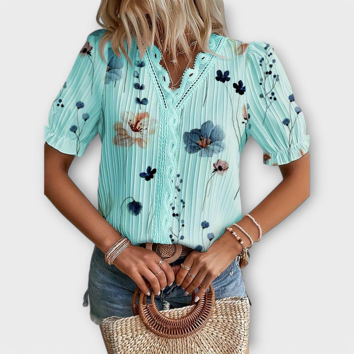 Emily - Blusa rosa con estampado floral y encaje