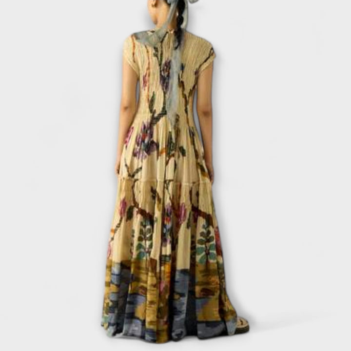 Amanda - Vestido maxi plisado amarillo con estampado