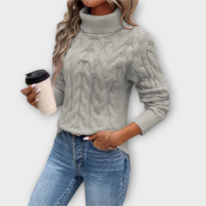 Amelia - Jersey elegante de cuello alto con patrón de trenzas