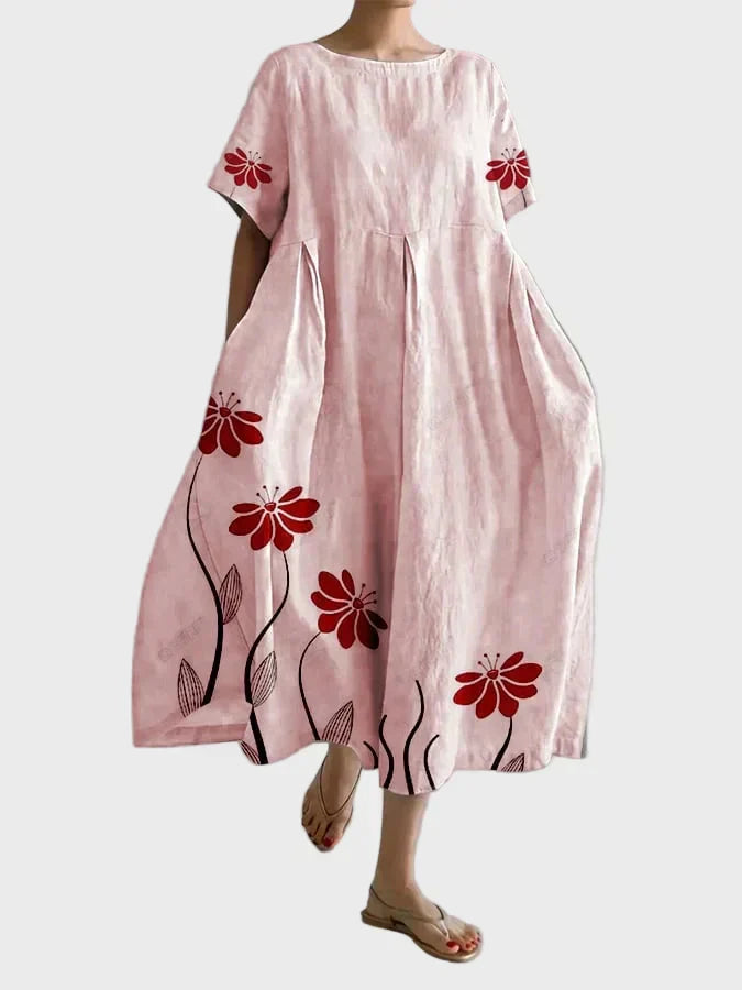 Vestido rosa con flores rojas
