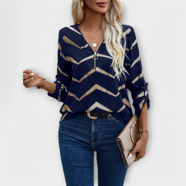 Emma - Blusa azul oscuro con diseño de zigzag dorado