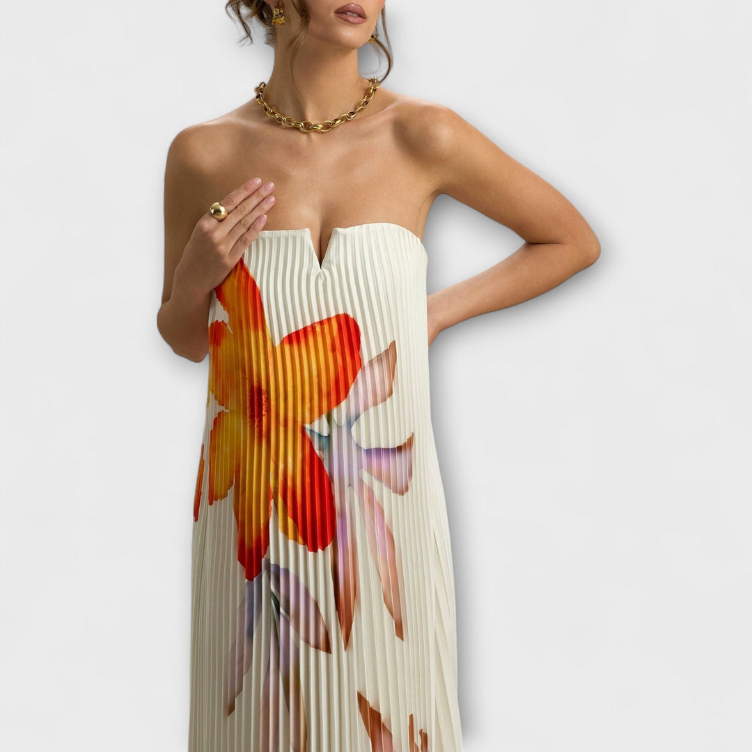 Michelle - Vestido maxilargo color crema con estampado de flores naranjas