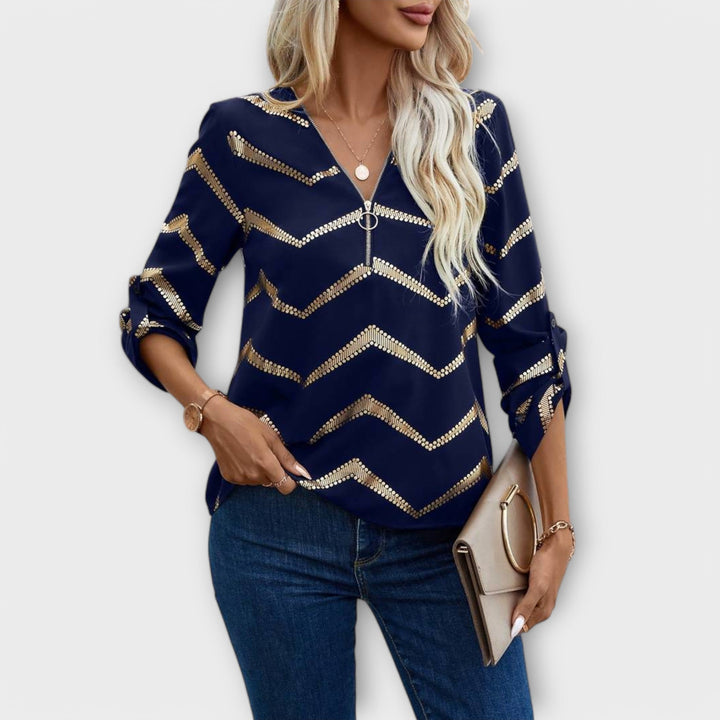 Emma - Blusa azul oscuro con diseño de zigzag dorado