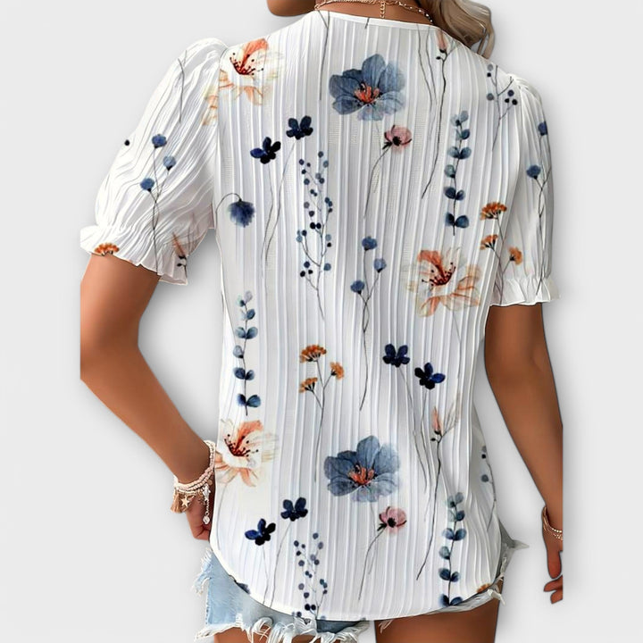 Emily - Blusa rosa con estampado floral y encaje