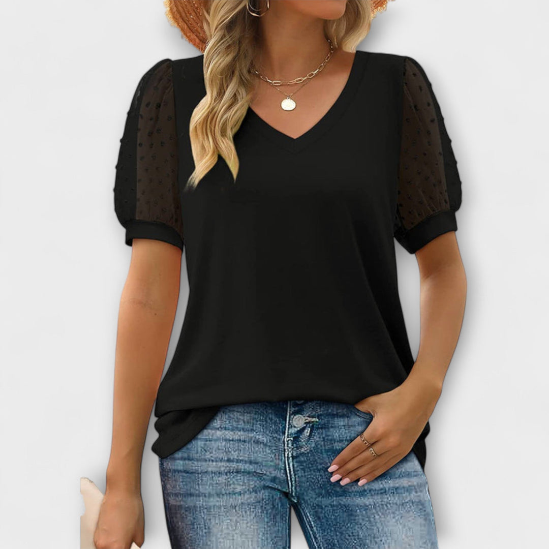 Rema - Top blanco con escote en V y mangas transparentes