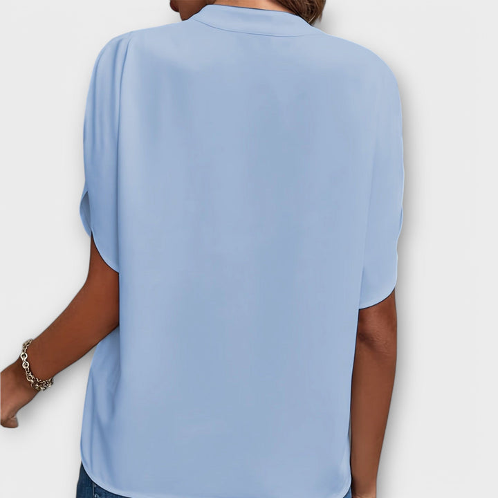 Vivi - Blusa ligera blanca con escote en V
