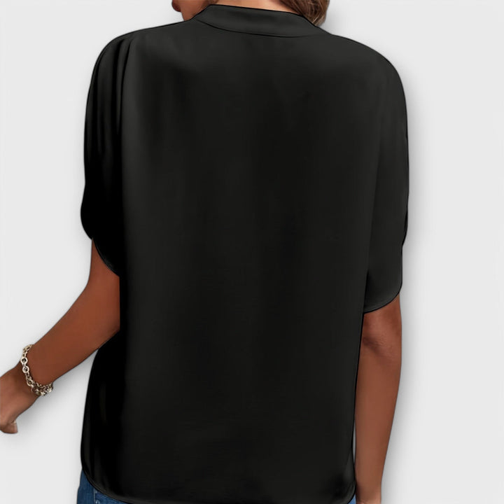 Vivi - Blusa ligera blanca con escote en V