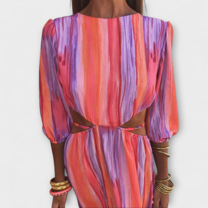 Paloma - Vestido de rayas coloridas con cortes modernos