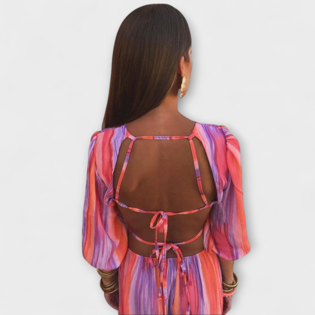 Paloma - Vestido de rayas coloridas con cortes modernos