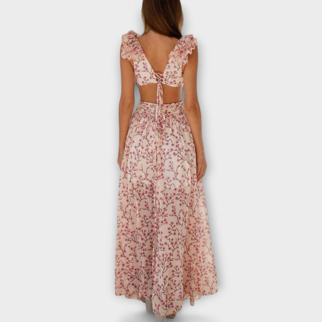 Elin - Vestido maxí rosa con volantes y cut-outs