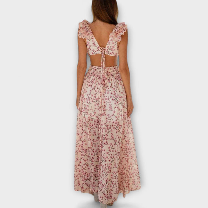 Elin - Vestido maxí rosa con volantes y cut-outs