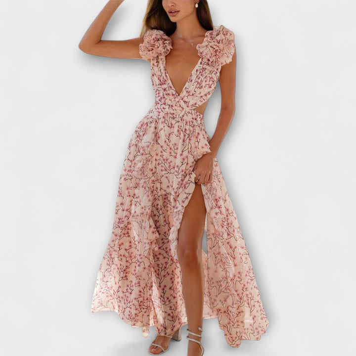 Elin - Vestido maxí rosa con volantes y cut-outs