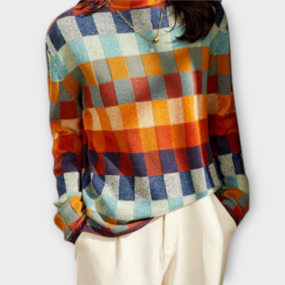 Erika - Jersey de patchwork colorido con cuello alto