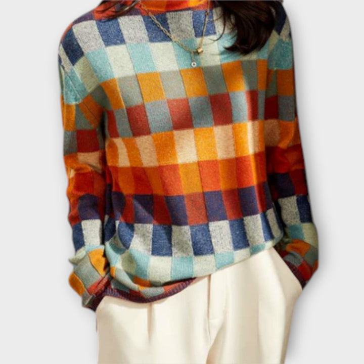 Erika - Jersey de patchwork colorido con cuello alto