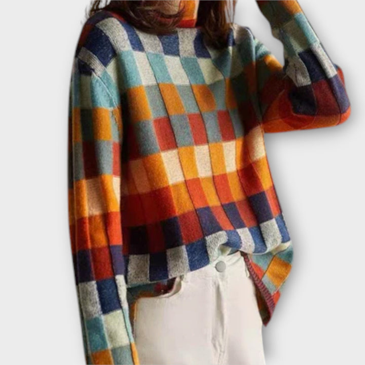 Erika - Jersey de patchwork colorido con cuello alto