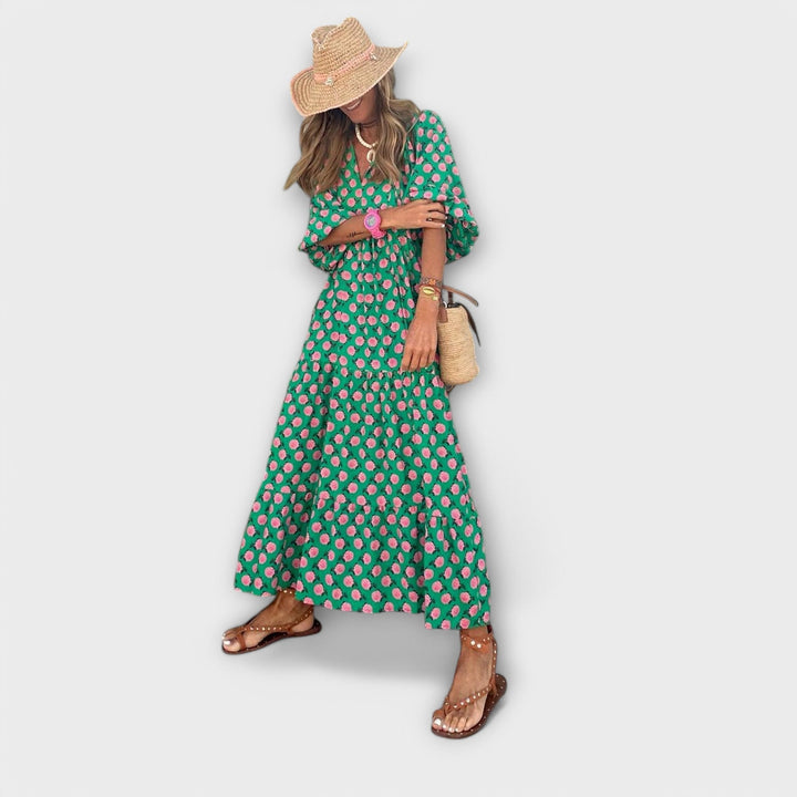 Elegante vestido maxi verde con patrón geométrico