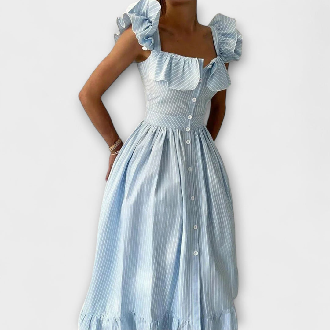 Lia - Vestido maxí de volantes en color crema