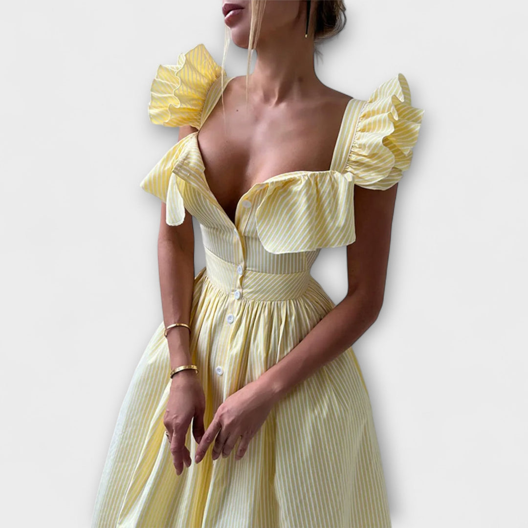 Lia - Vestido maxí de volantes en color crema