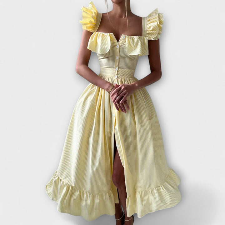 Lia - Vestido maxí de volantes en color crema