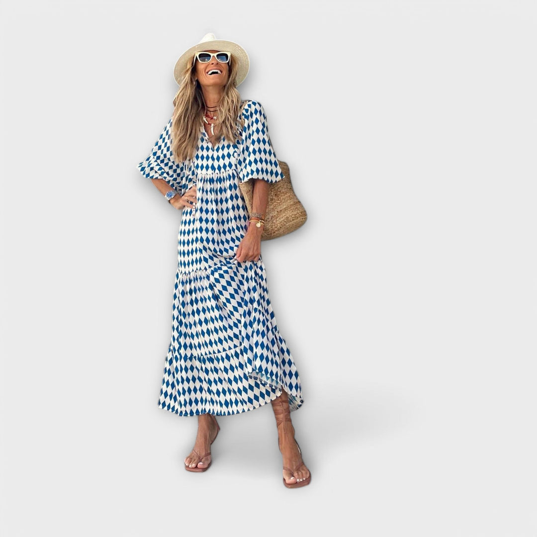 Elegante vestido maxi verde con patrón geométrico