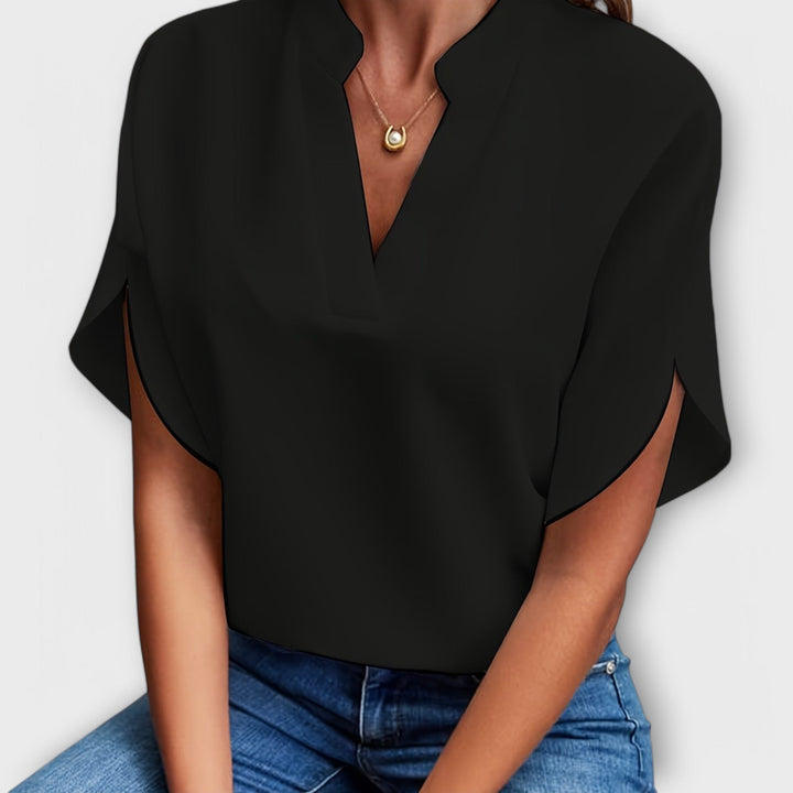 Vivi - Blusa ligera blanca con escote en V