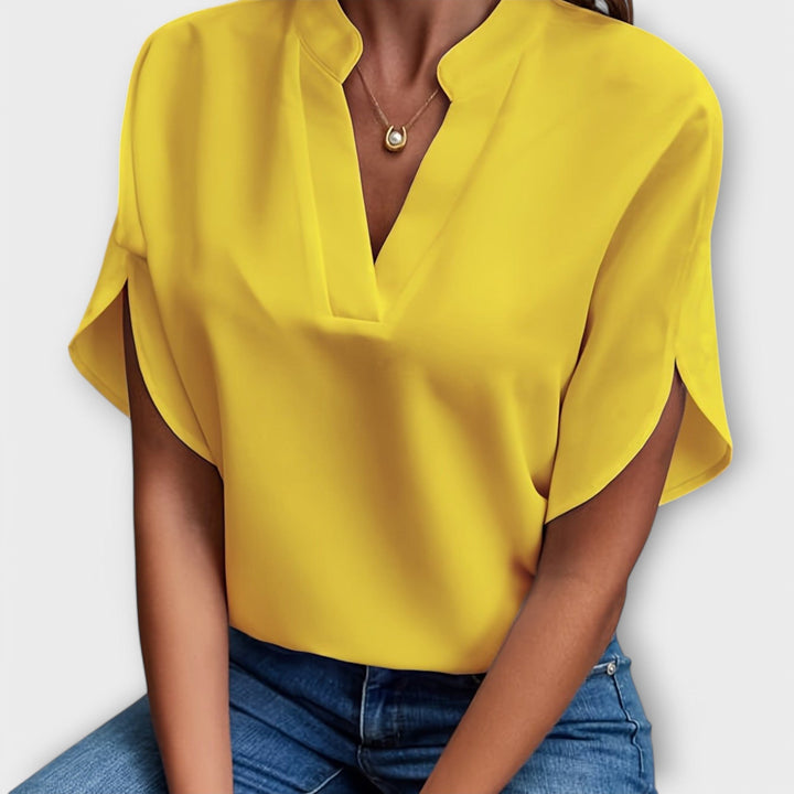 Vivi - Blusa ligera blanca con escote en V