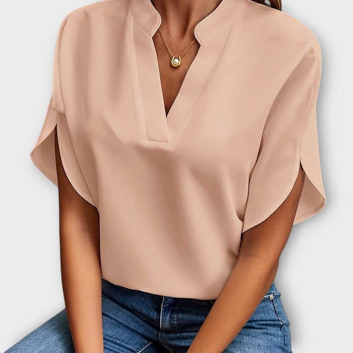 Vivi - Blusa ligera blanca con escote en V