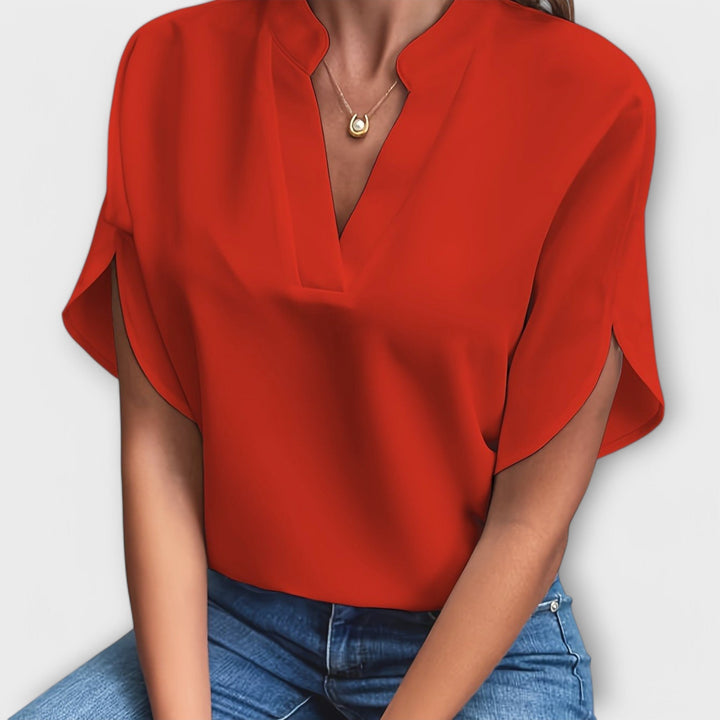 Vivi - Blusa ligera blanca con escote en V