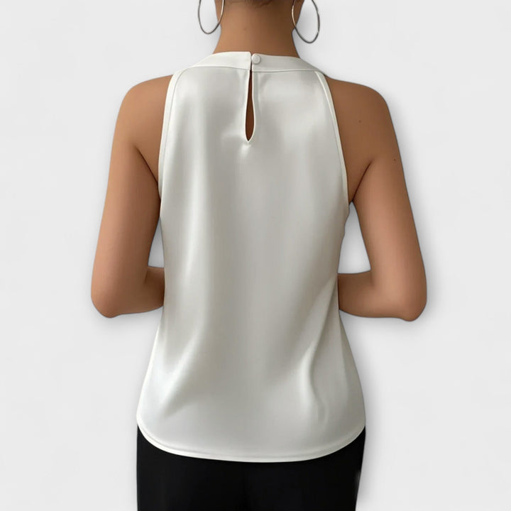 Skye - Top off-shoulder en color champán