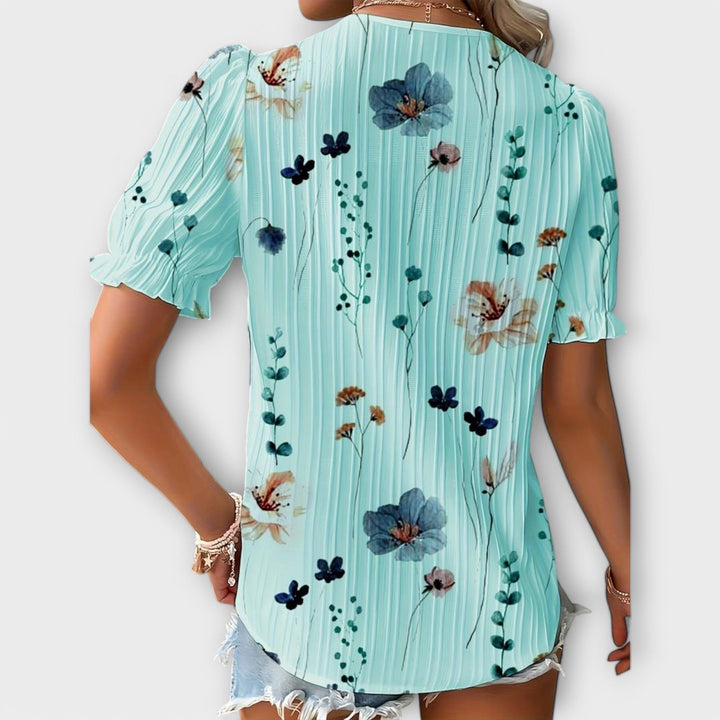 Emily - Blusa rosa con estampado floral y encaje
