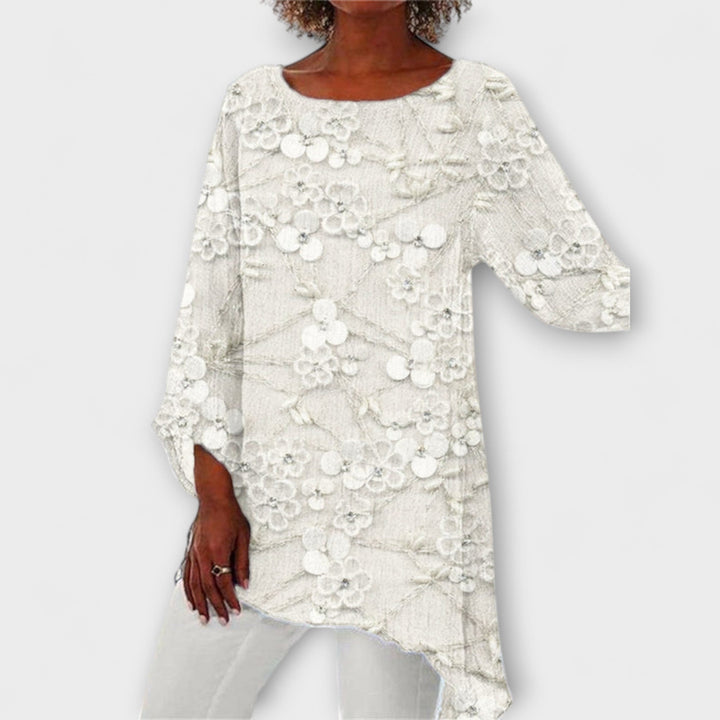 Harper - Blusa beige con estampado floral de cristal