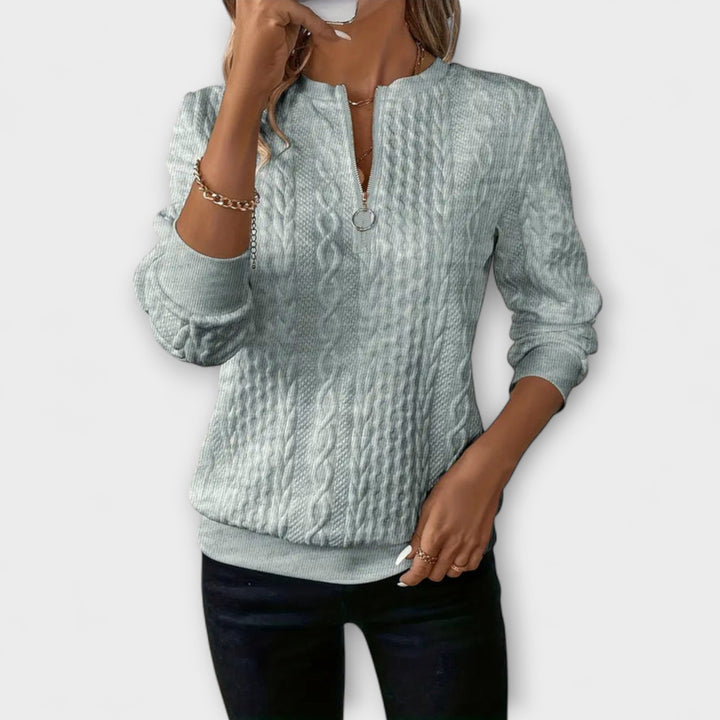 Joy - Jersey elegante de punto con patrón de trenzas