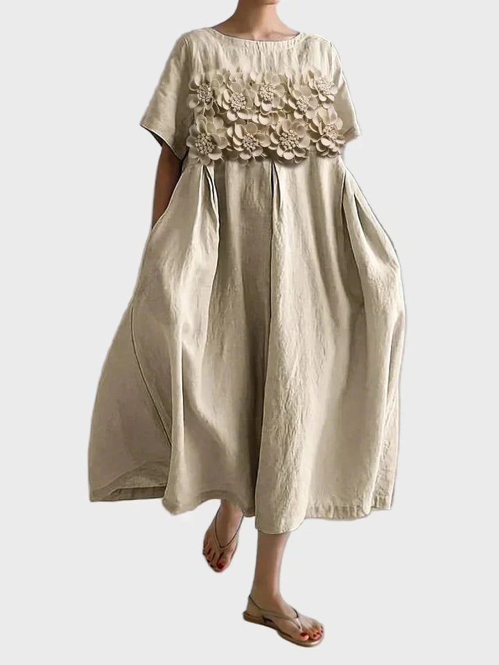 Vestido de lino beige con volantes