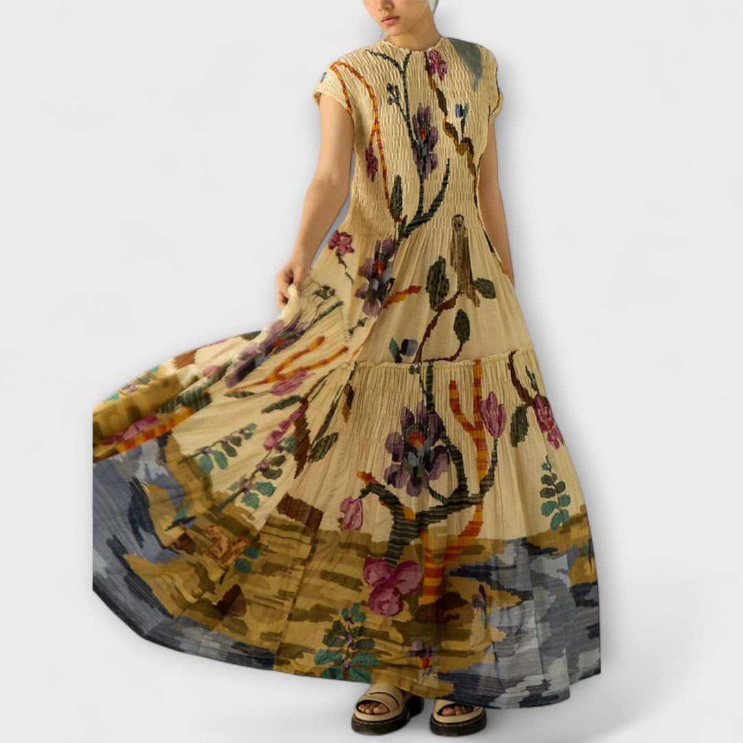 Amara - Vestido maxi plisado con estampado animal