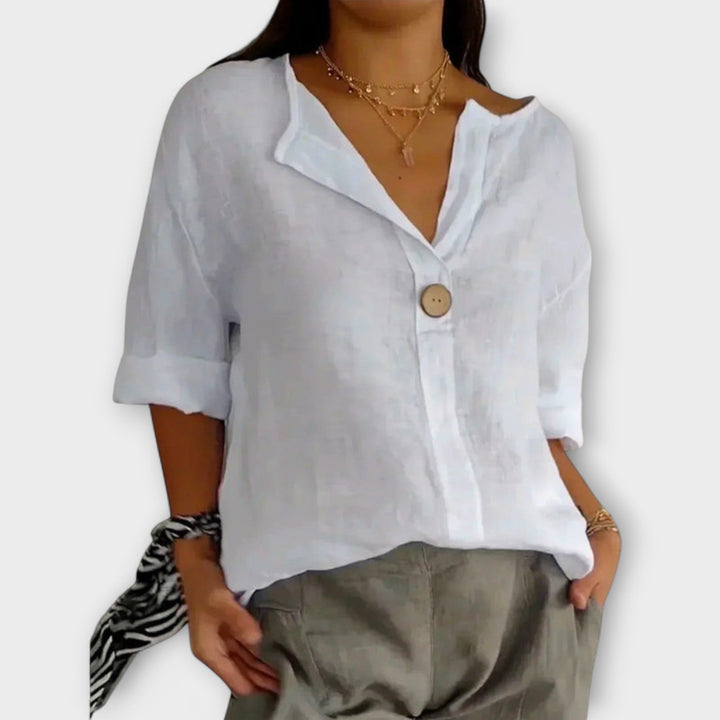Nicole - Blusa elegante beige con escote en V