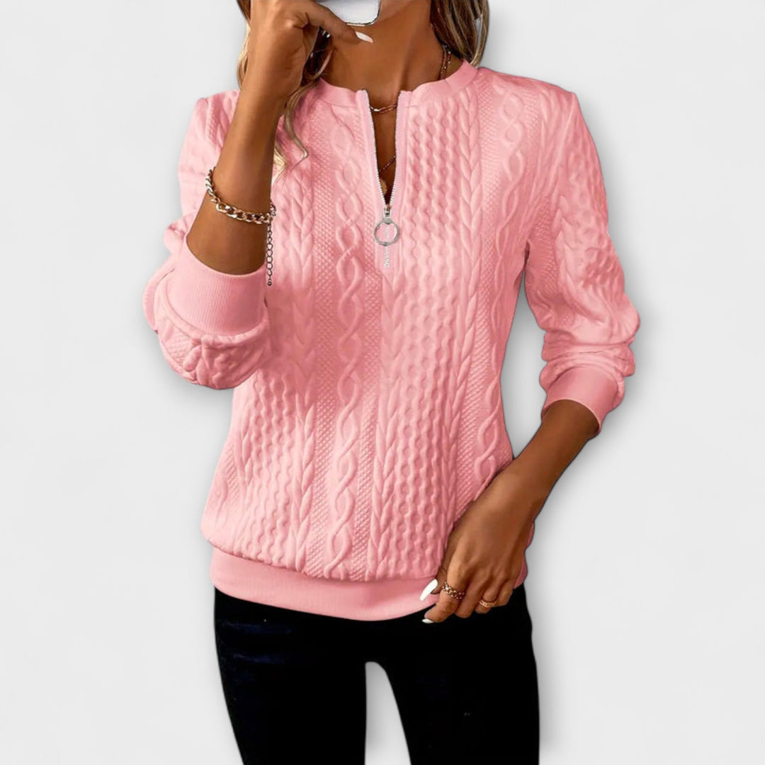 Joy - Jersey elegante de punto con patrón de trenzas