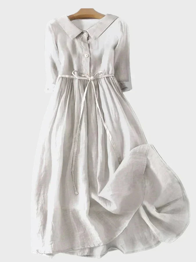 Vestido de cuello azul claro con cinturón