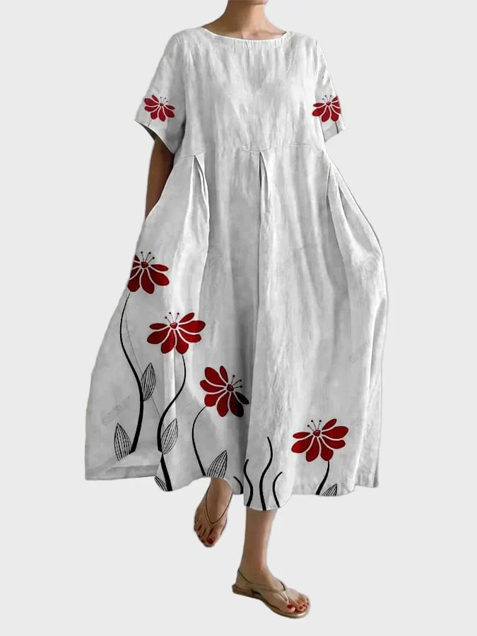 Vestido rosa con flores rojas