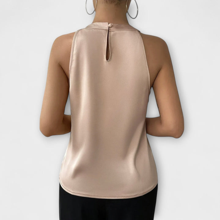 Skye - Top off-shoulder en color champán