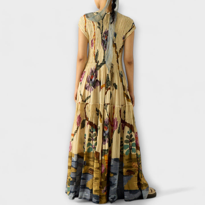 Amara - Vestido maxi plisado con estampado animal